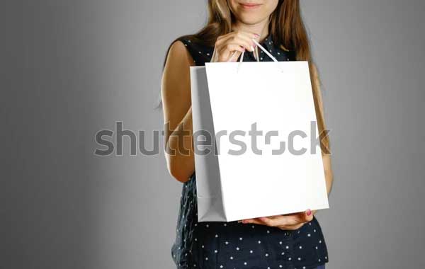 Holding White Gift Bag Mockup