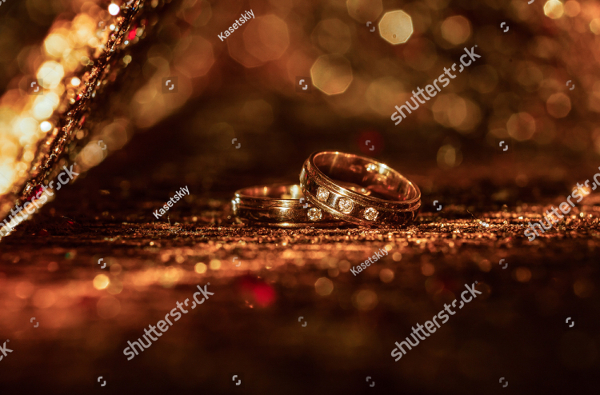Wedding Rings On Abstract Background